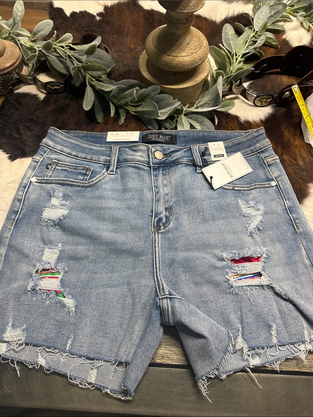 NWT Judy Blue Light Blue Distressed Denim Shorts with serape Patch Detail